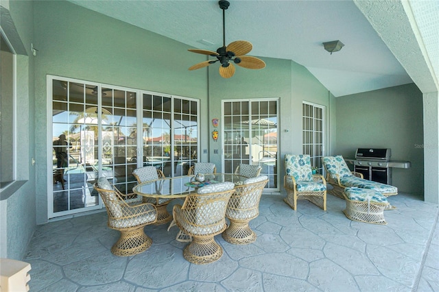 view of patio featuring a grill and ceiling fan