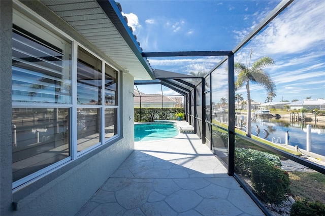 sunroom with a water view