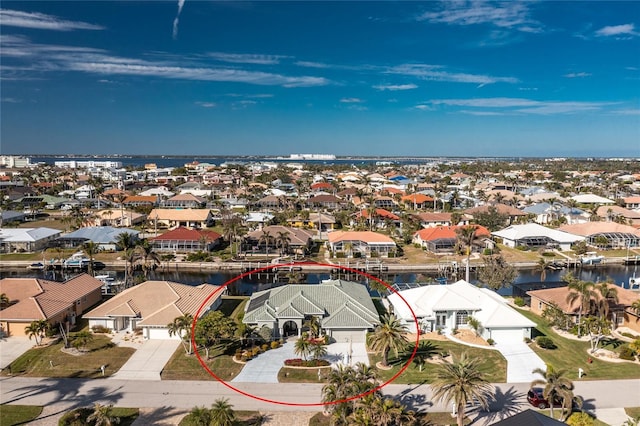 aerial view featuring a water view