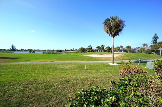 view of home's community featuring a lawn