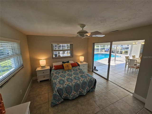 tiled bedroom featuring access to outside and ceiling fan