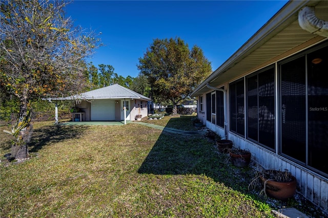 view of yard with a garage