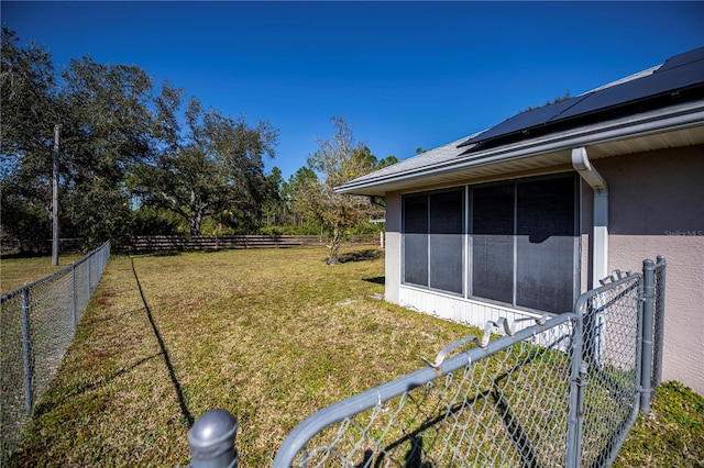 view of yard featuring a sunroom