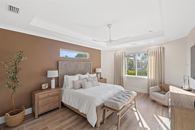 bedroom featuring a tray ceiling