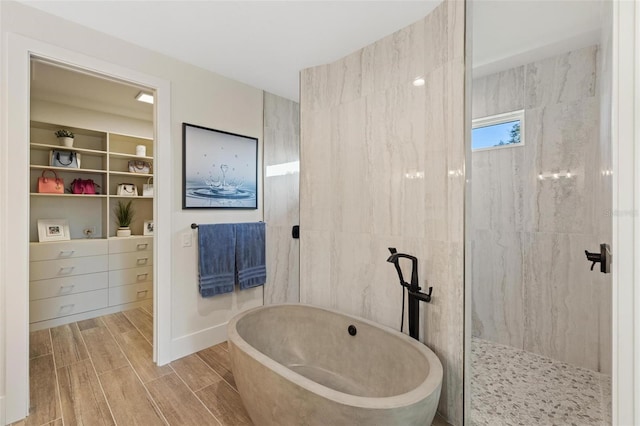 bathroom featuring plus walk in shower