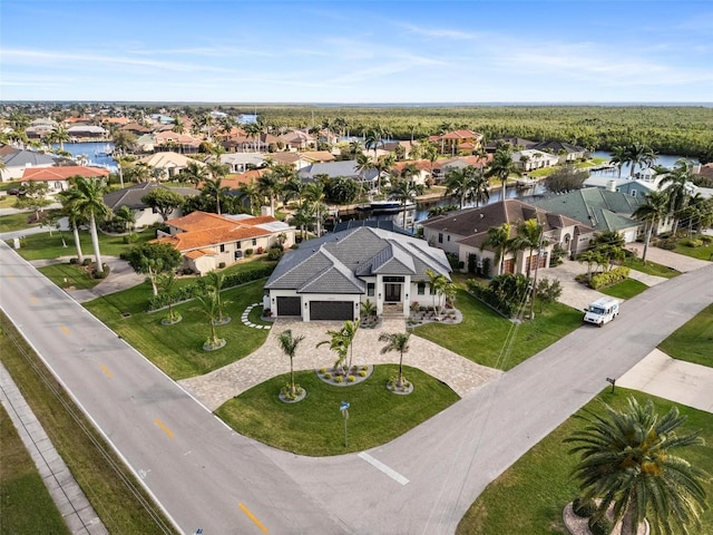 bird's eye view with a water view