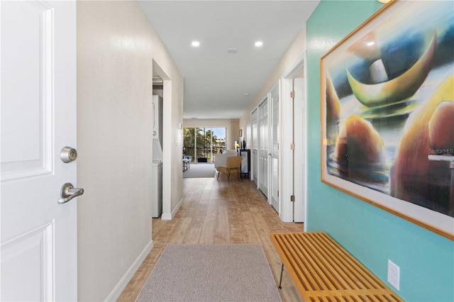 hall with light hardwood / wood-style flooring