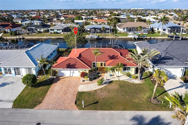 drone / aerial view with a water view