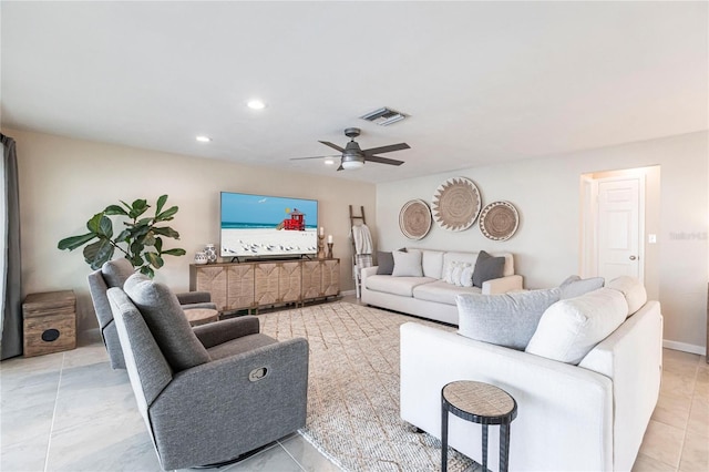 tiled living room featuring ceiling fan