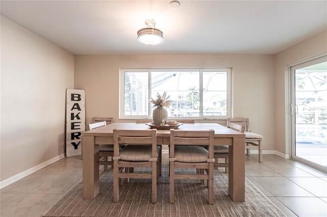 view of tiled dining space