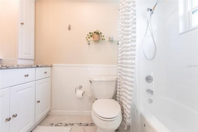 full bathroom with toilet, vanity, and shower / bath combo with shower curtain