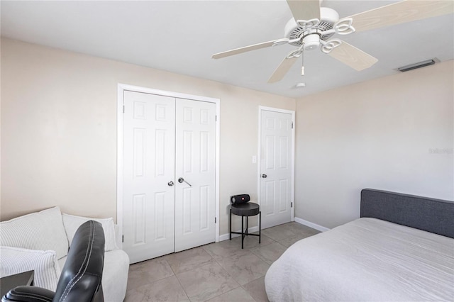 bedroom featuring a closet and ceiling fan