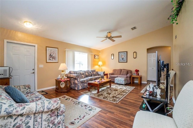 living room with vaulted ceiling, dark wood-type flooring, and ceiling fan