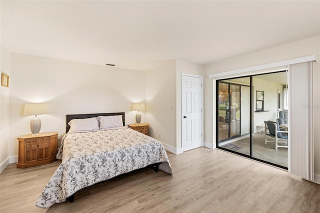 bedroom featuring light wood-type flooring