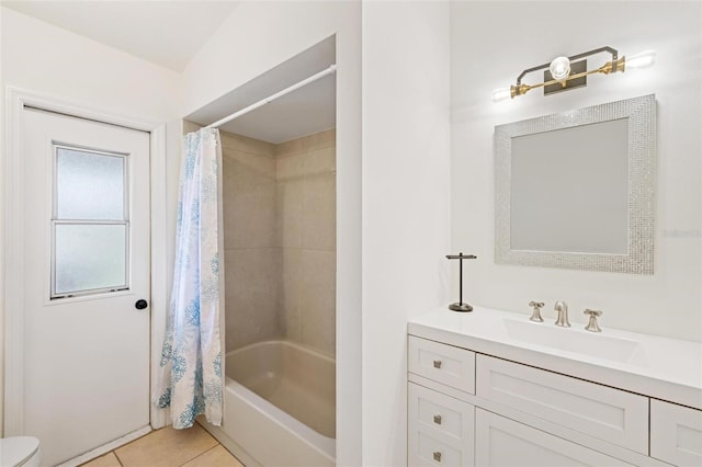 bathroom featuring shower / bathtub combination with curtain, vanity, and tile patterned flooring