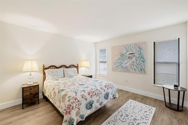 bedroom featuring hardwood / wood-style flooring