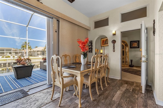 dining area featuring dark hardwood / wood-style floors