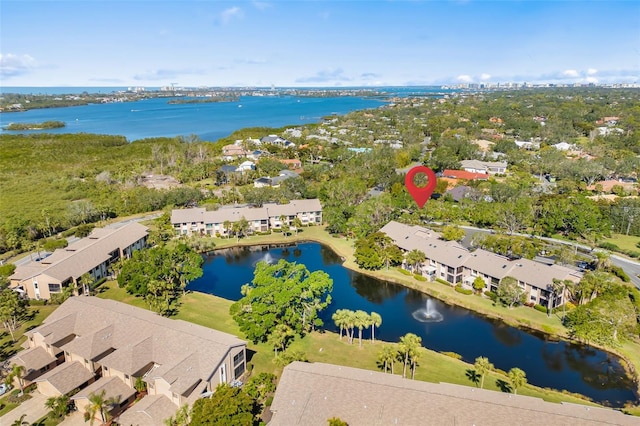 drone / aerial view with a water view