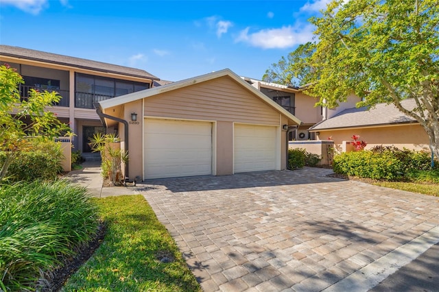 front of property with a garage