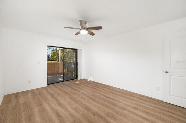 empty room featuring light hardwood / wood-style floors and ceiling fan