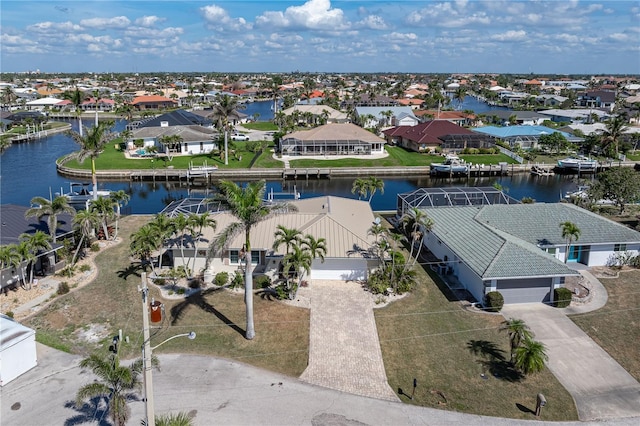 aerial view featuring a water view and a residential view