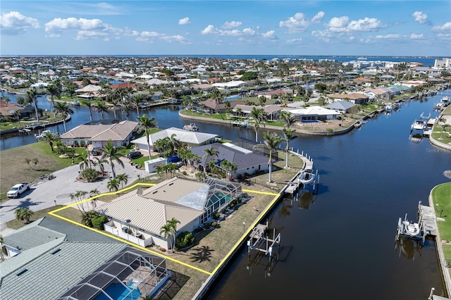 aerial view with a water view and a residential view