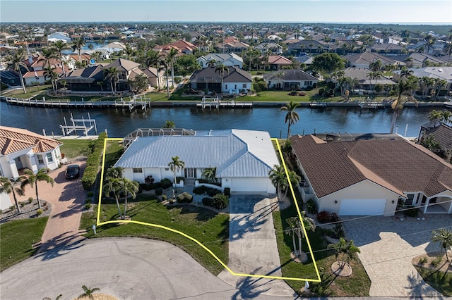 drone / aerial view featuring a water view