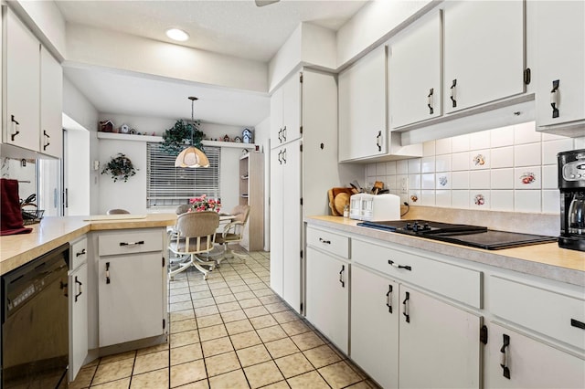 kitchen featuring white cabinetry and black appliances