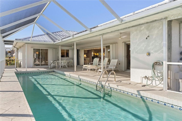 view of pool featuring a lanai and a patio