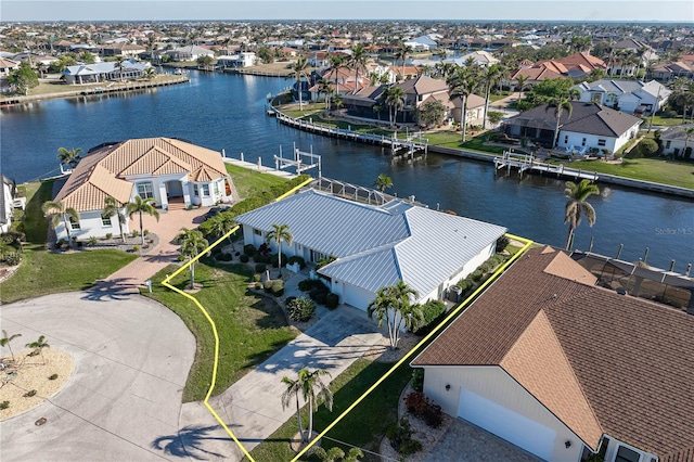 drone / aerial view featuring a water view