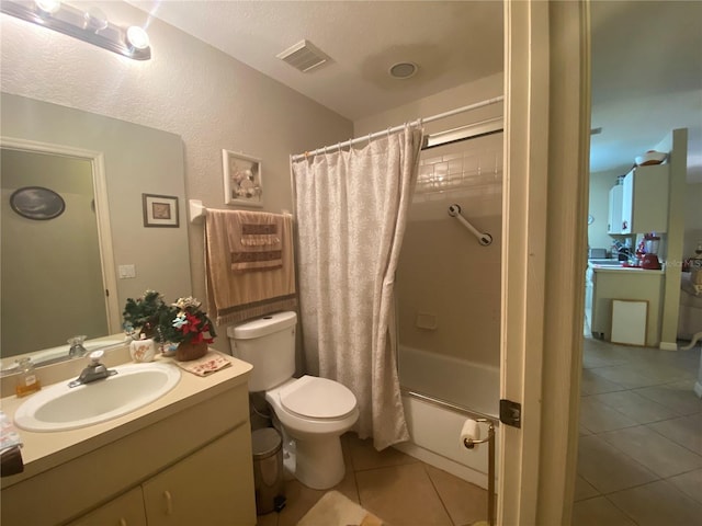 full bathroom with shower / tub combo with curtain, vanity, toilet, and tile patterned flooring