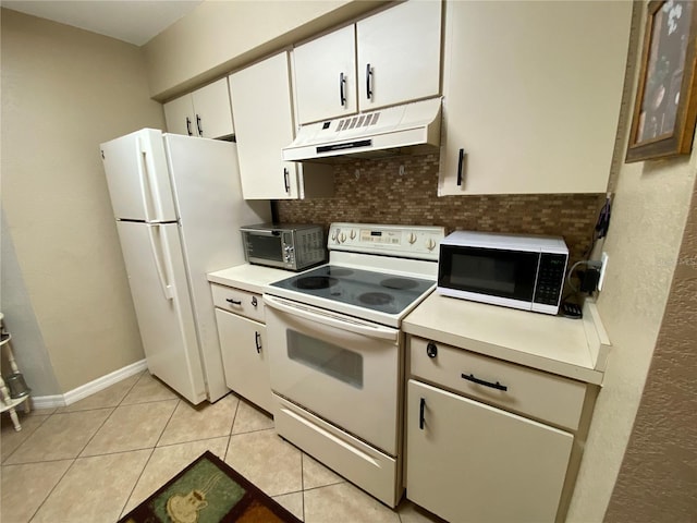 kitchen with tasteful backsplash, light countertops, white cabinetry, white appliances, and under cabinet range hood