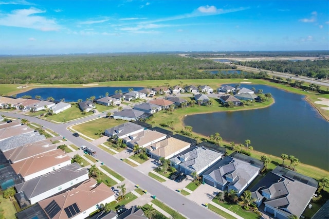 drone / aerial view featuring a water view