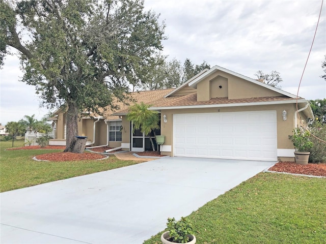 ranch-style home with a garage and a front lawn