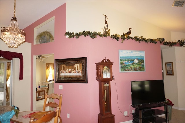 interior space with ceiling fan