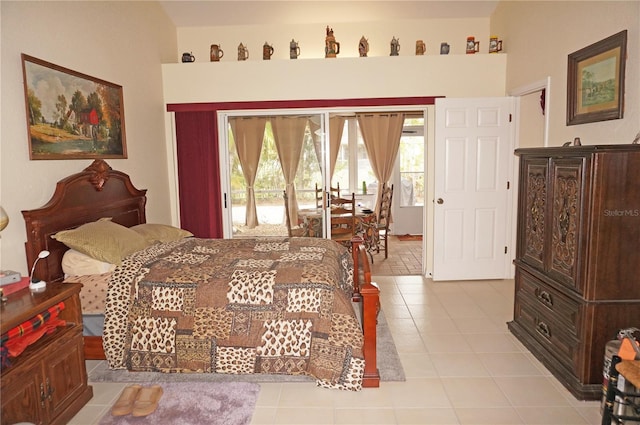 tiled bedroom featuring access to exterior