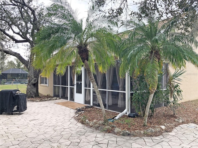 exterior space with a sunroom