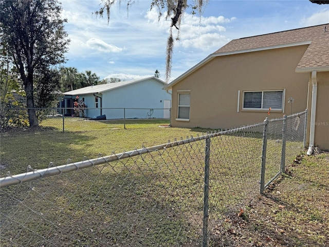 view of home's exterior featuring a yard