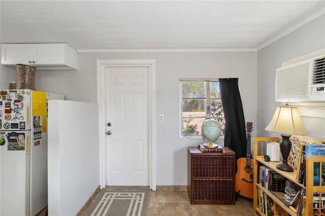 interior space with crown molding and a wall mounted AC