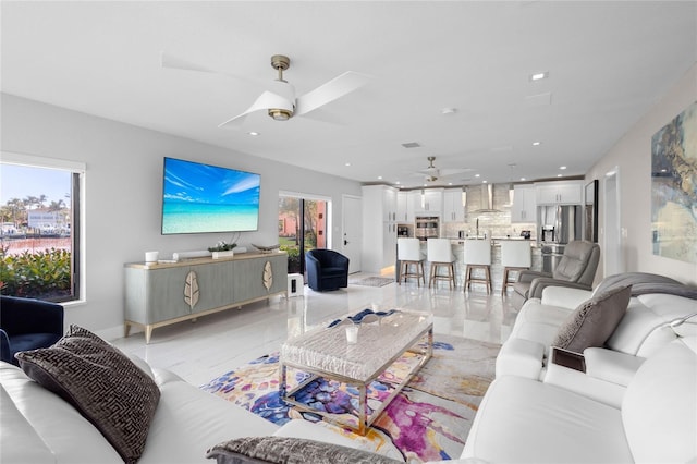 living room with ceiling fan