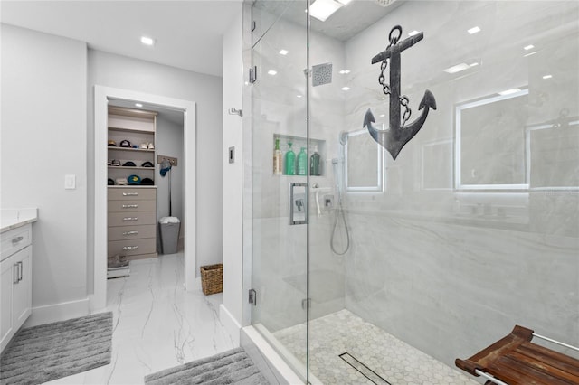 bathroom with vanity and walk in shower