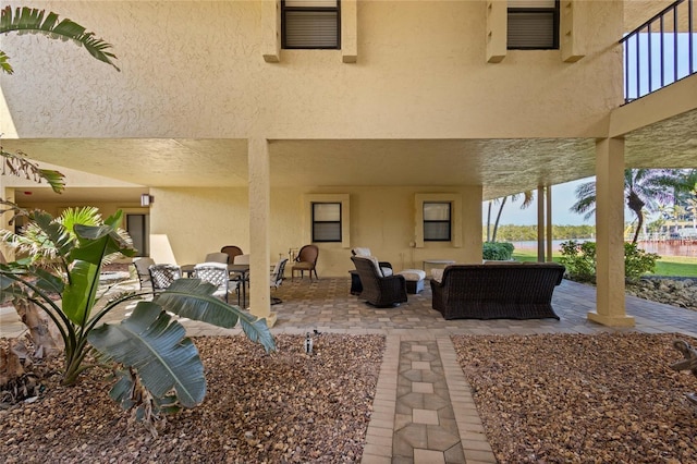 exterior space featuring an outdoor hangout area