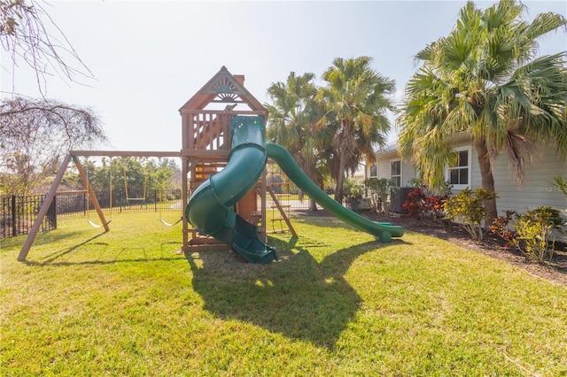 view of jungle gym featuring a lawn