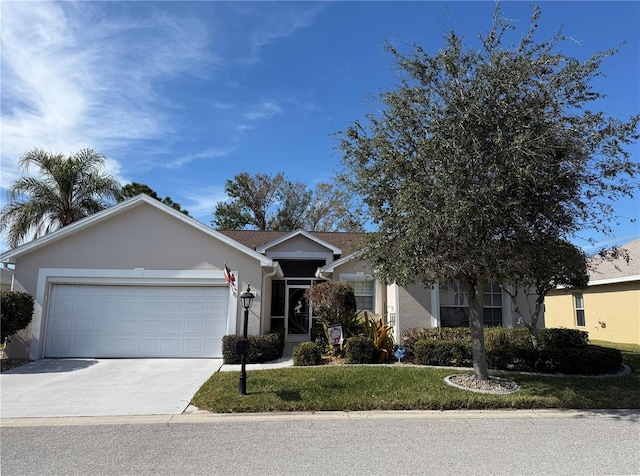 ranch-style house with a garage and a front yard