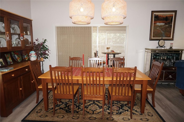 dining area with wood-type flooring