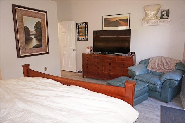 bedroom with light hardwood / wood-style floors