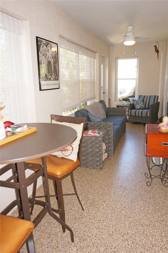 living room with ceiling fan