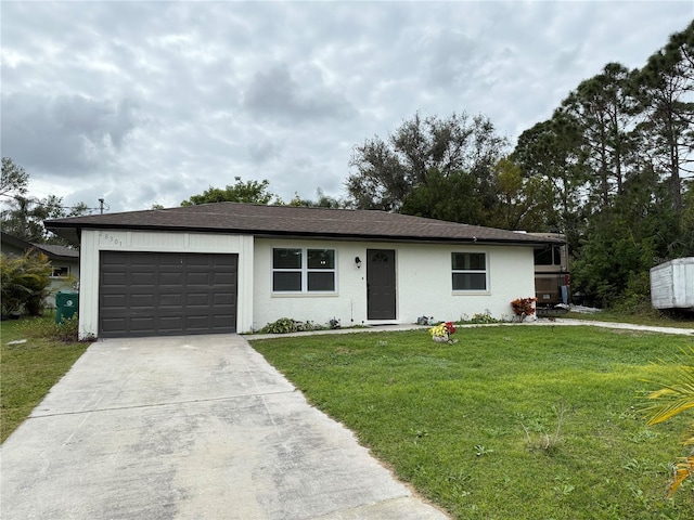 single story home with a garage and a front yard