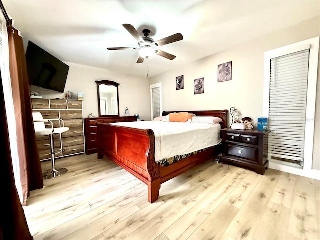 bedroom featuring ceiling fan and light hardwood / wood-style floors