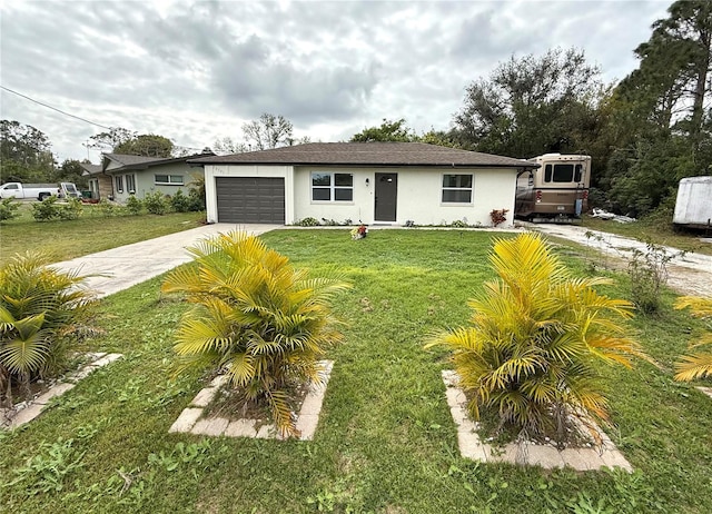 ranch-style house with a garage and a front yard